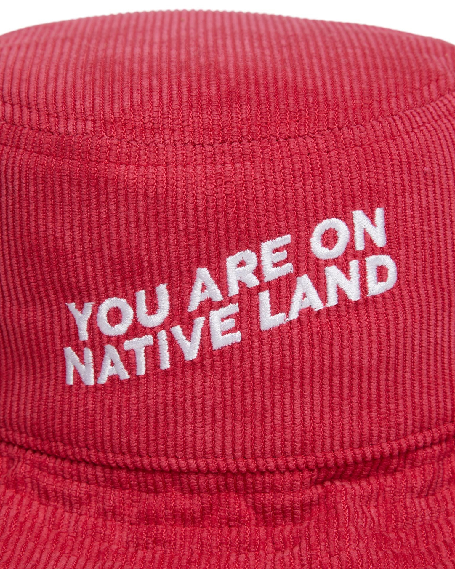 'YOU ARE ON NATIVE LAND' CORDUROY BUCKET HAT