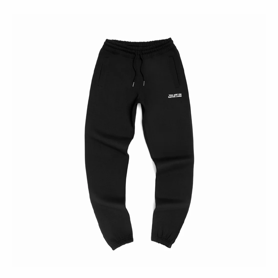 'YOU ARE ON NATIVE LAND' ORGANIC COTTON SWEATPANTS