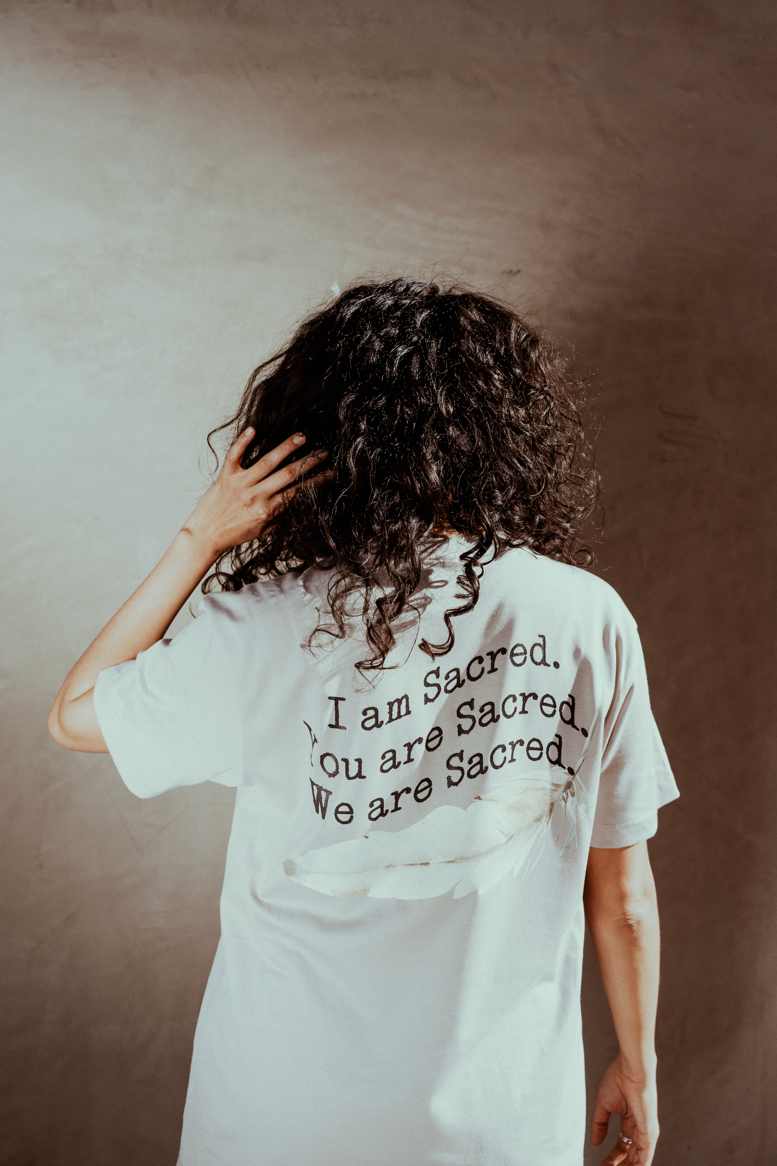 'SACRED LESSONS' FEATHER SUPIMA COTTON TEE