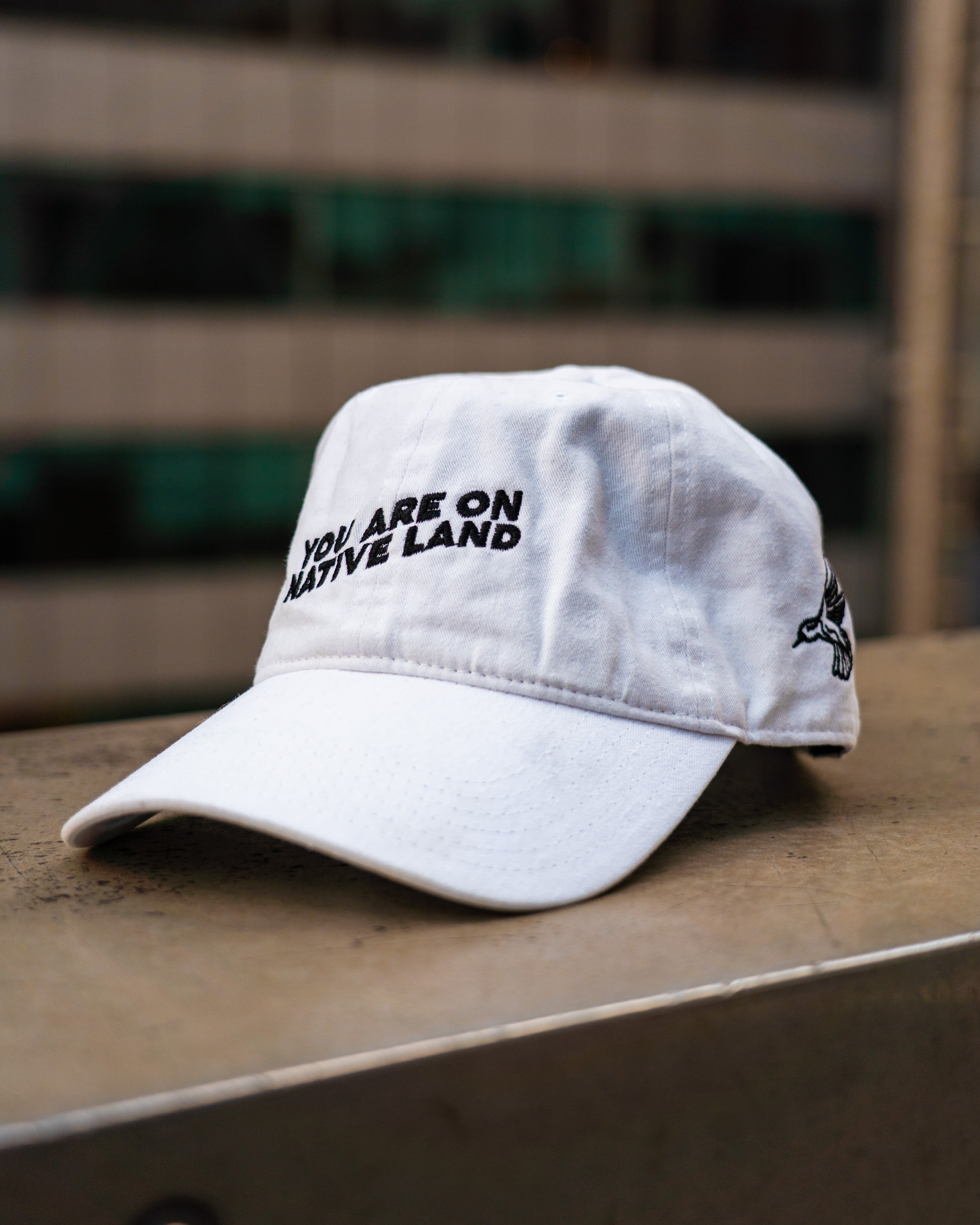 'YOU ARE ON NATIVE LAND' DAD CAP - WHITE