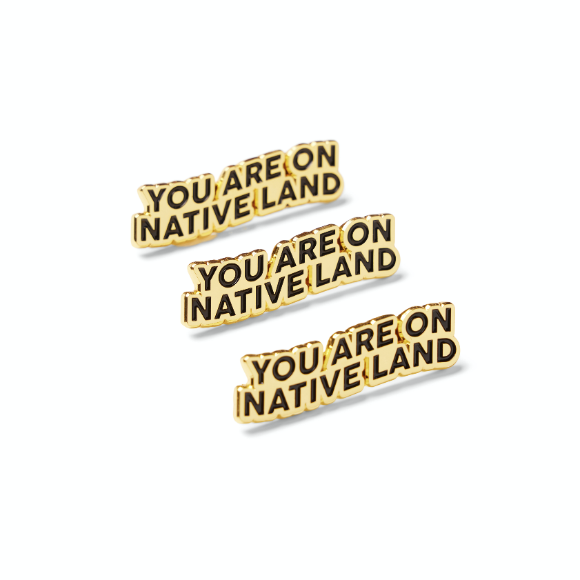 'YOU ARE ON NATIVE LAND' PIN - GOLD