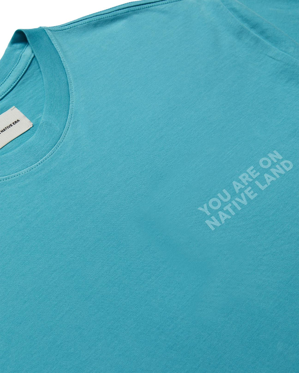 'YOU ARE ON NATIVE LAND' EVERYDAY TEE - TURQUOISE TONIC