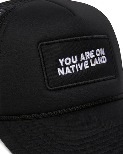 'YOU ARE ON NATIVE LAND' TRUCKER - BLACK EMBROIDERY