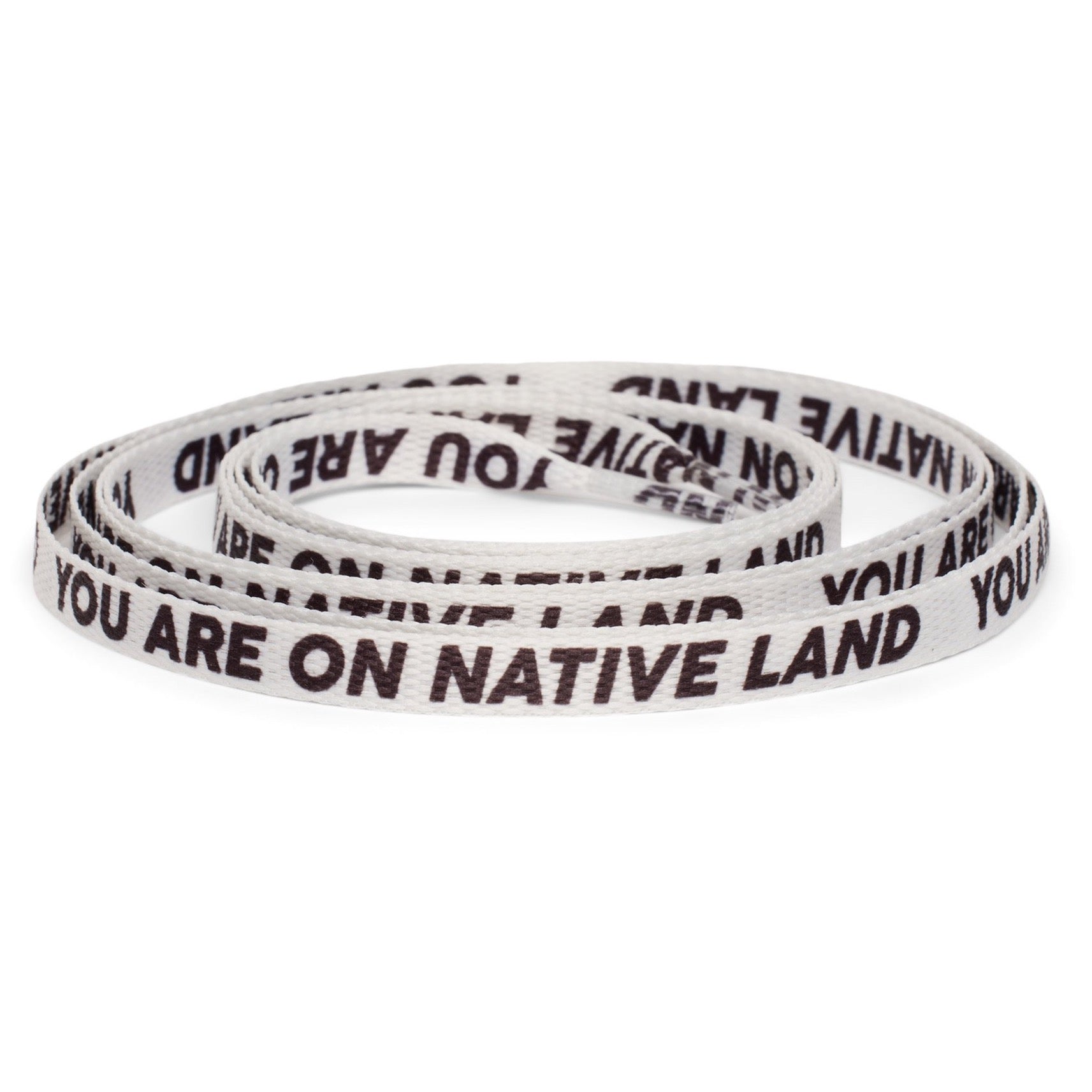 'YOU ARE ON NATIVE LAND' LACES - WHITE