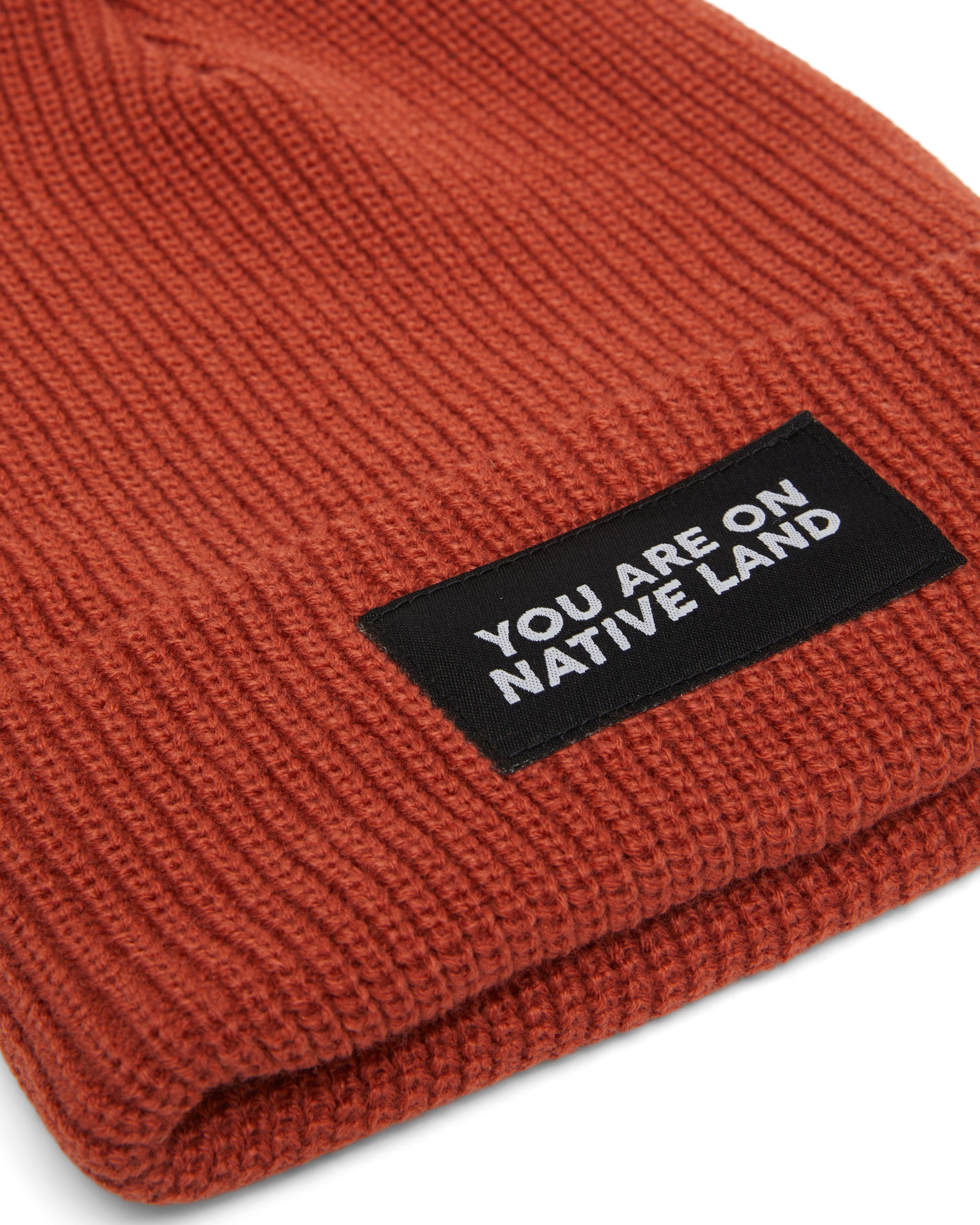 'YOU ARE ON NATIVE LAND' RIBBED BEANIE